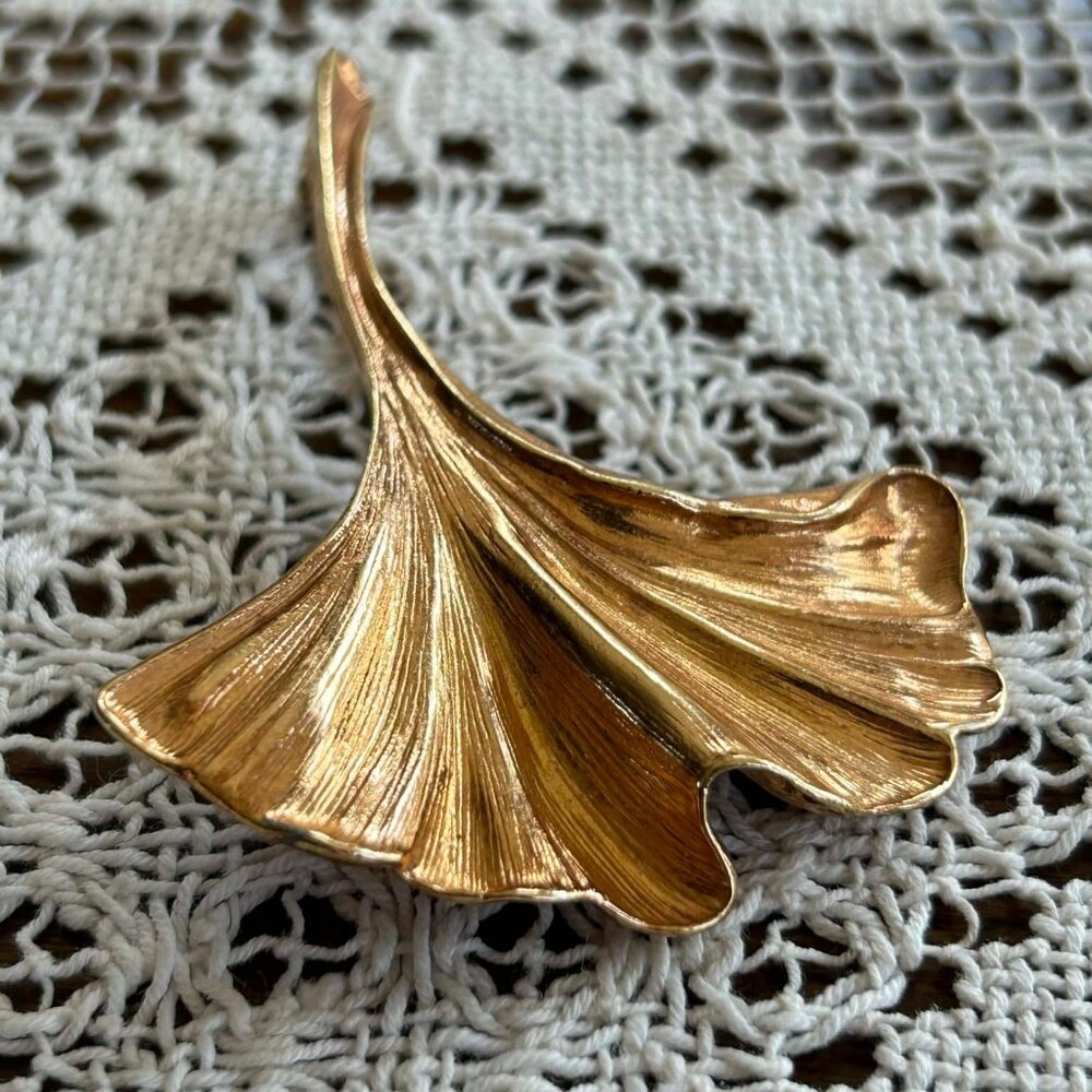 MCM gold tone leaf brooch